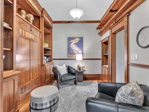 This charming studio features original wood trim on every wall and stunning parquet floors that reflect the home’s rich history and craftsmanship. A hidden Murphy bed adds versatility, making it ideal as a fifth bedroom or guest retreat.