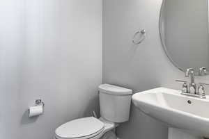 Bathroom with a sink and toilet