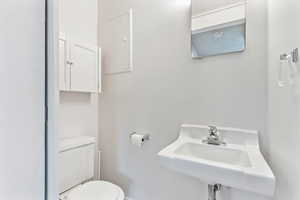 Bathroom with toilet and a sink