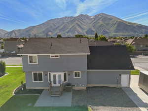 View of mountain background featuring nearby suburban area
