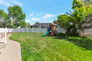 View of yard featuring a playground