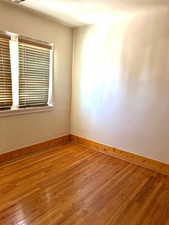 Bedroom with hardwood floors