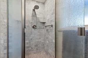Bathroom featuring a stall shower