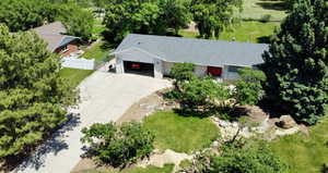 Drone / arial View from above of Rambler style home and .47 acre property