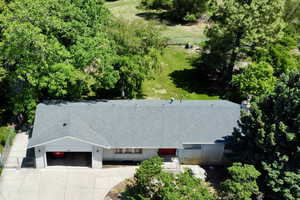Drone / Aerial view of property and surrounding area