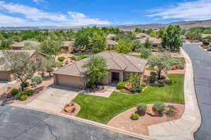 View from above of property with a mountainous background