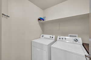 Laundry room featuring washing machine and dryer