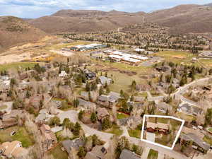 View of property location with property boundaries highlighted, nearby suburban area, and mountains