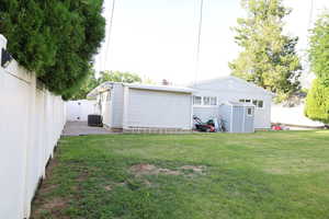 Back of property with central AC unit
