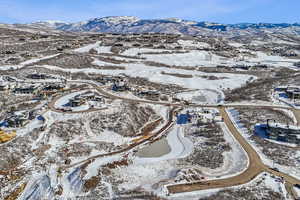 Snowy aerial view with a mountain view