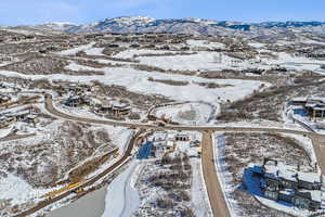 Snowy aerial view with a mountain view