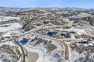 Snowy aerial view with a mountain view