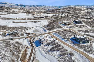 Snowy aerial view with a mountain view