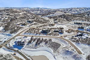 Snowy aerial view with a mountain view