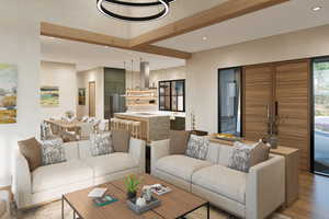 Living room featuring recessed lighting, a high ceiling, and beamed ceiling