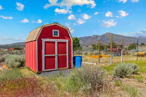 View of shed featuring a mountain view and a view of countryside