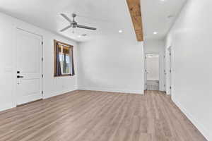 Unfurnished room featuring ceiling fan, light wood finished floors, recessed lighting, and a textured ceiling