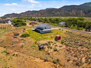 Overview of rural landscape with a mountain backdrop