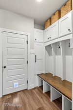Mudroom with wood finished floors