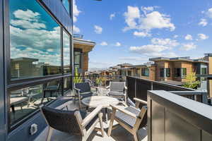 Balcony featuring a residential view