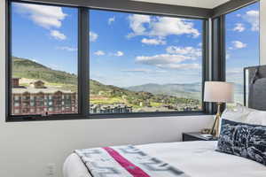 Bedroom featuring a mountain view