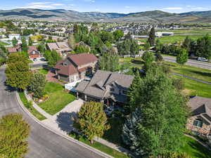 Aerial view of residential area with a mountainous background