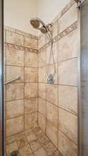Full bath with a shower stall