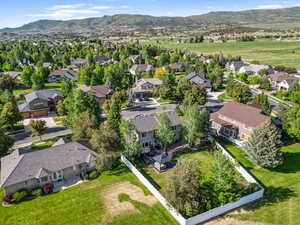 Aerial view of residential area with a mountain backdrop