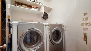 Laundry area featuring independent washer and dryer