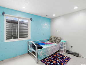 Bedroom featuring recessed lighting