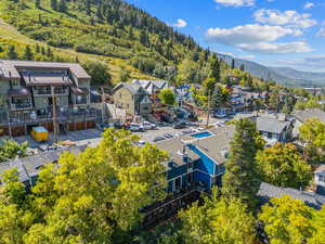 Aerial perspective of suburban area with mountains