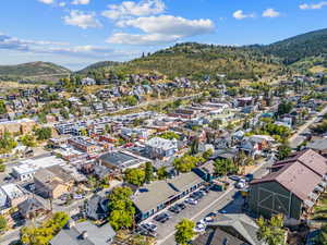 Aerial perspective of suburban area with mountains