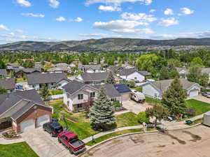 Aerial perspective of suburban area with mountains