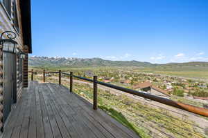 Wooden deck featuring a mountain view