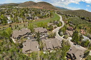 View of property location with nearby suburban area and a mountain backdrop