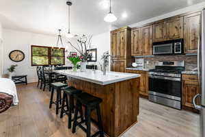 Featuring new wood flooring and quartz countertop