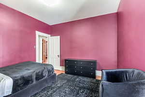 Bedroom with wood finished floors