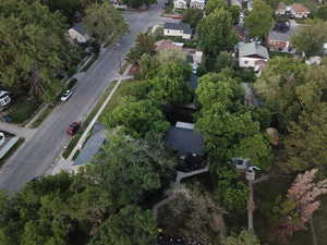 Aerial view of property's location featuring mature trees