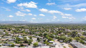 Aerial view of residential area with mountains