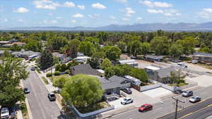 Aerial view of residential area featuring a mountainous background