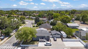 Aerial perspective of suburban area with a mountain backdrop