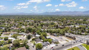 Aerial view of residential area featuring a mountain backdrop