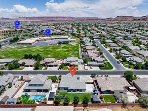 Aerial view of residential area with a mountainous background