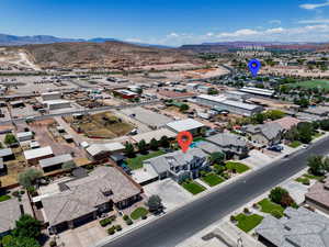 Aerial view of residential area with a mountain backdrop