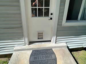 View of property entrance-to the backyard