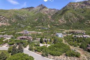 View of mountain background featuring nearby suburban area