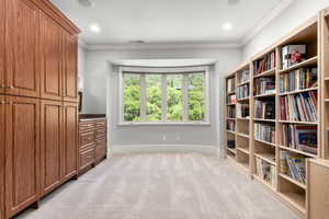 Unfurnished room featuring ornamental molding, baseboards, light carpet, and recessed lighting