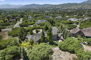 Aerial view of residential area featuring a mountain backdrop