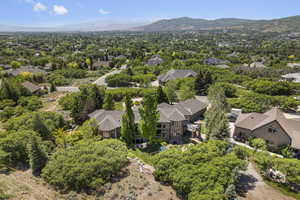 Aerial view of residential area with a mountainous background