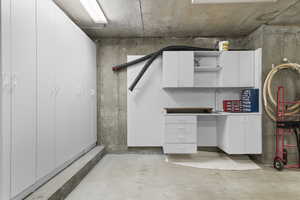 Garage with workbench and lockers